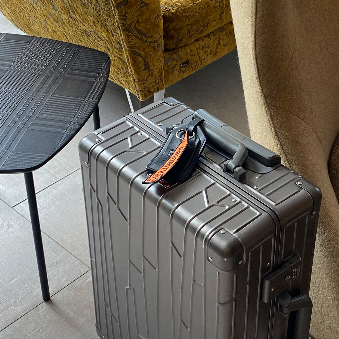 gundel priority tag grey aluminium suitcase