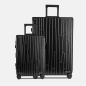 Preview: Two GUNDEL suitcases in black with a line pattern, telescopic handles, and TSA locks against a white background.