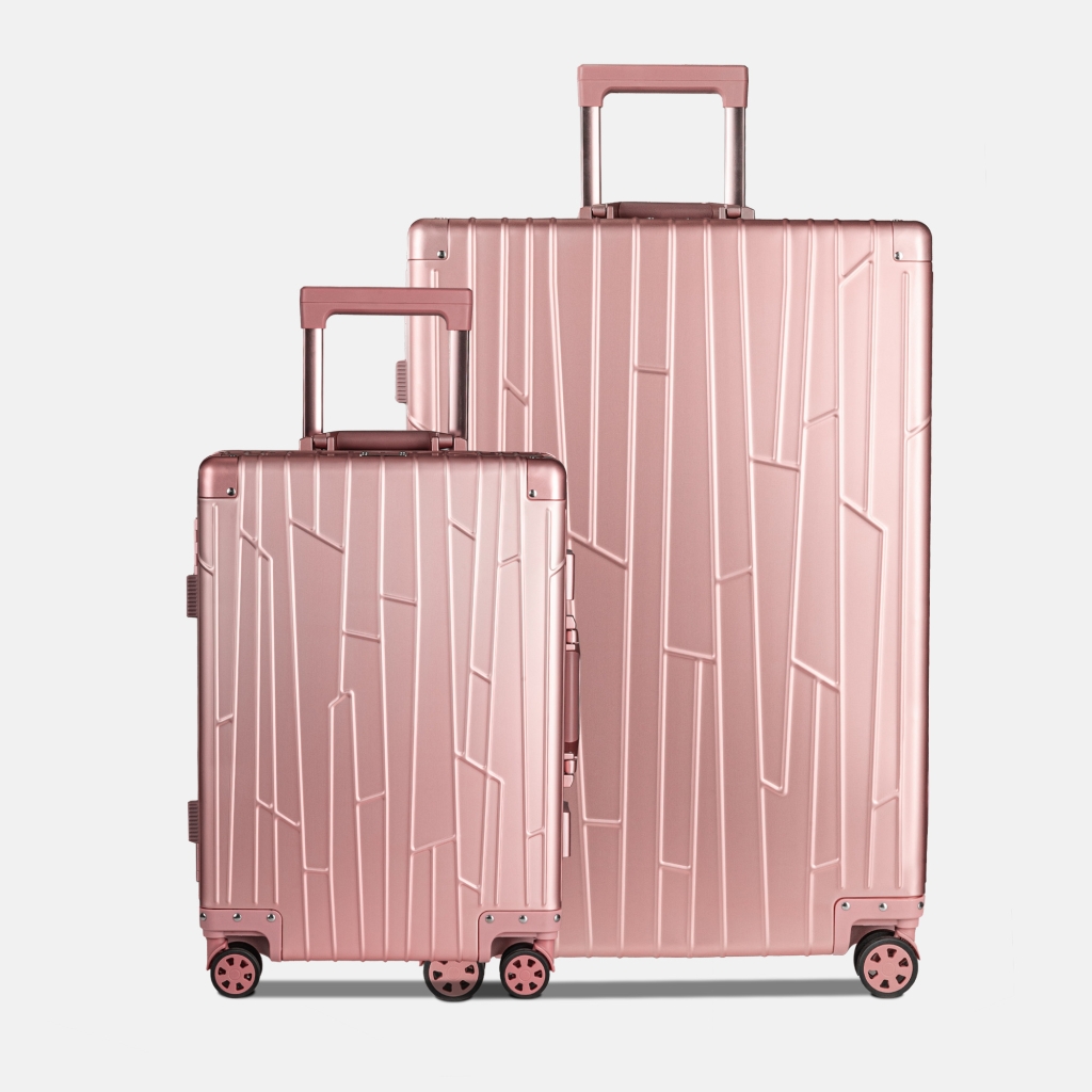 Preview: Zwei GUNDEL Koffer in rosegold in Frontansicht mit Linienmuster und Teleskopgriffen - stehen nebeneinander vor weißem Hintergrund.