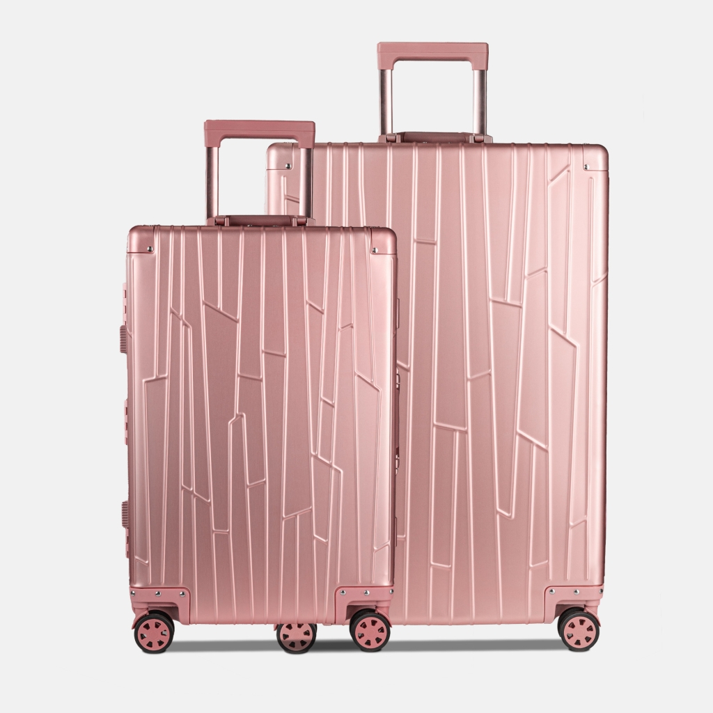 Preview: Zwei GUNDEL Koffer in rosegold in Frontansicht mit Linienmuster und Teleskopgriffen - stehen nebeneinander vor weißem Hintergrund.