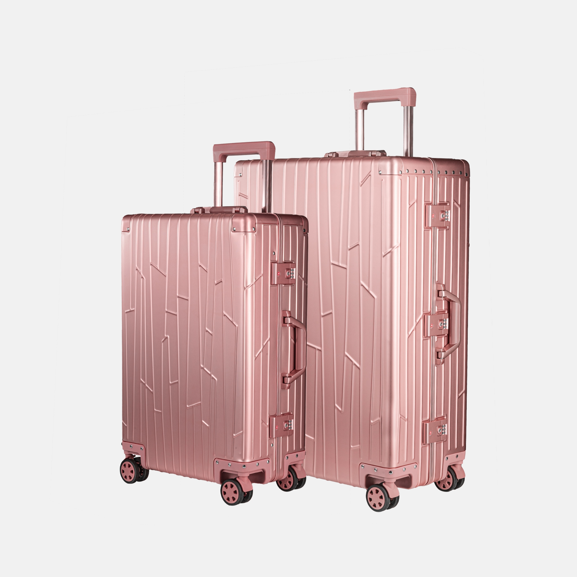 Zwei GUNDEL Koffer in rosegold, schräg stehend, mit Linienmuster, Teleskopgriffen und TSA-Schlössern vor weißem Hintergrund.