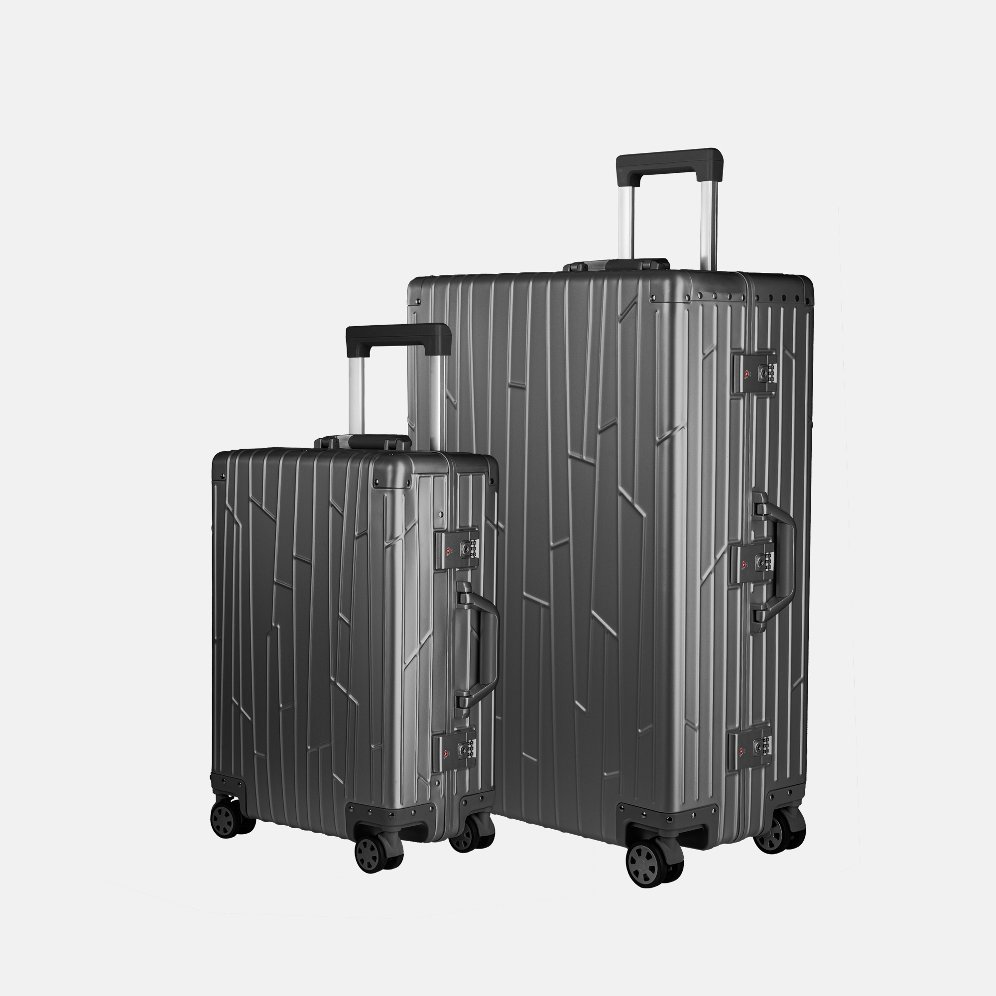 Zwei GUNDEL Koffer in Space Grau, schräg stehend, mit Linienmuster, Teleskopgriffen und TSA-Schlössern vor weißem Hintergrund.