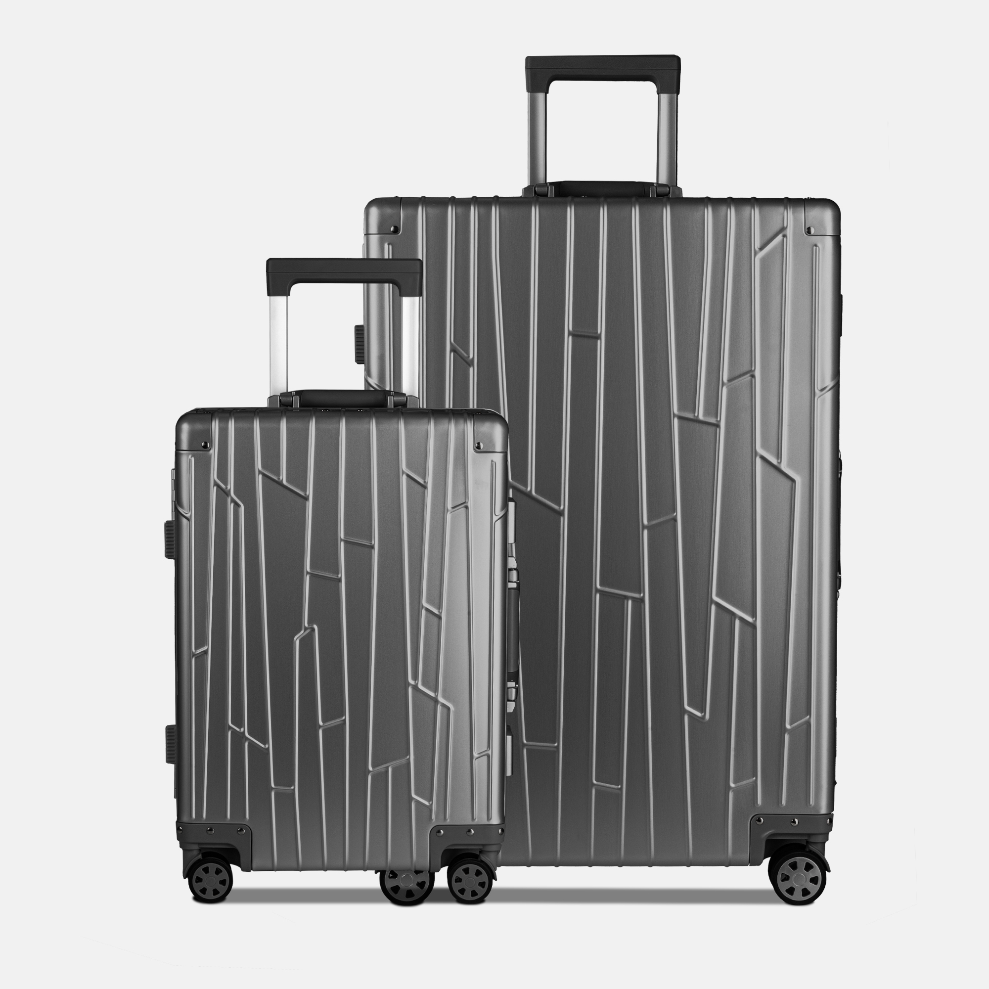 Zwei GUNDEL Koffer in Space Grau, schräg stehend, mit Linienmuster, Teleskopgriffen und TSA-Schlössern vor weißem Hintergrund.