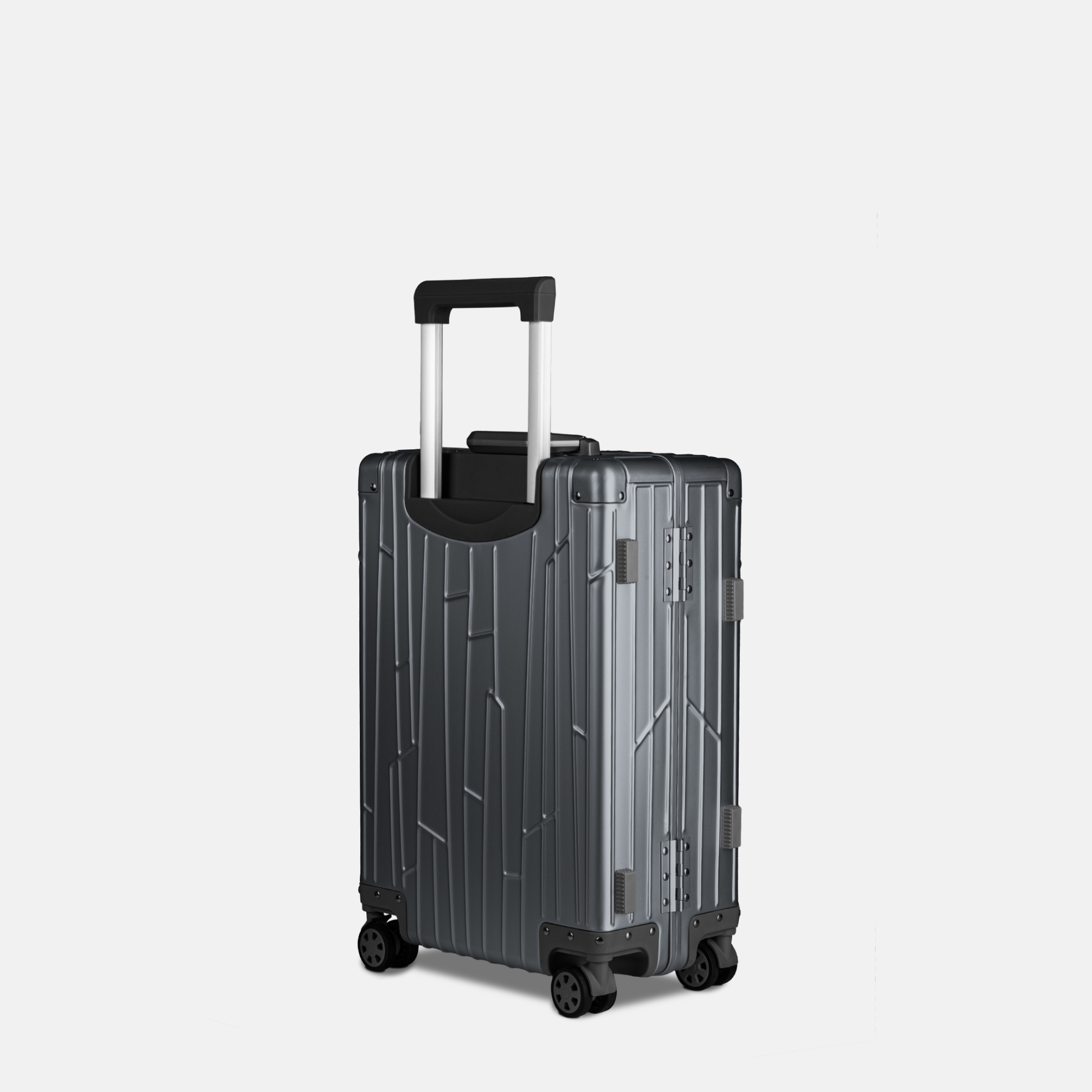 Seitenansicht des GUNDEL Aluminiumkoffers in Blau Grau mit Teleskopgriff, Scharnieren und vier Rollen.