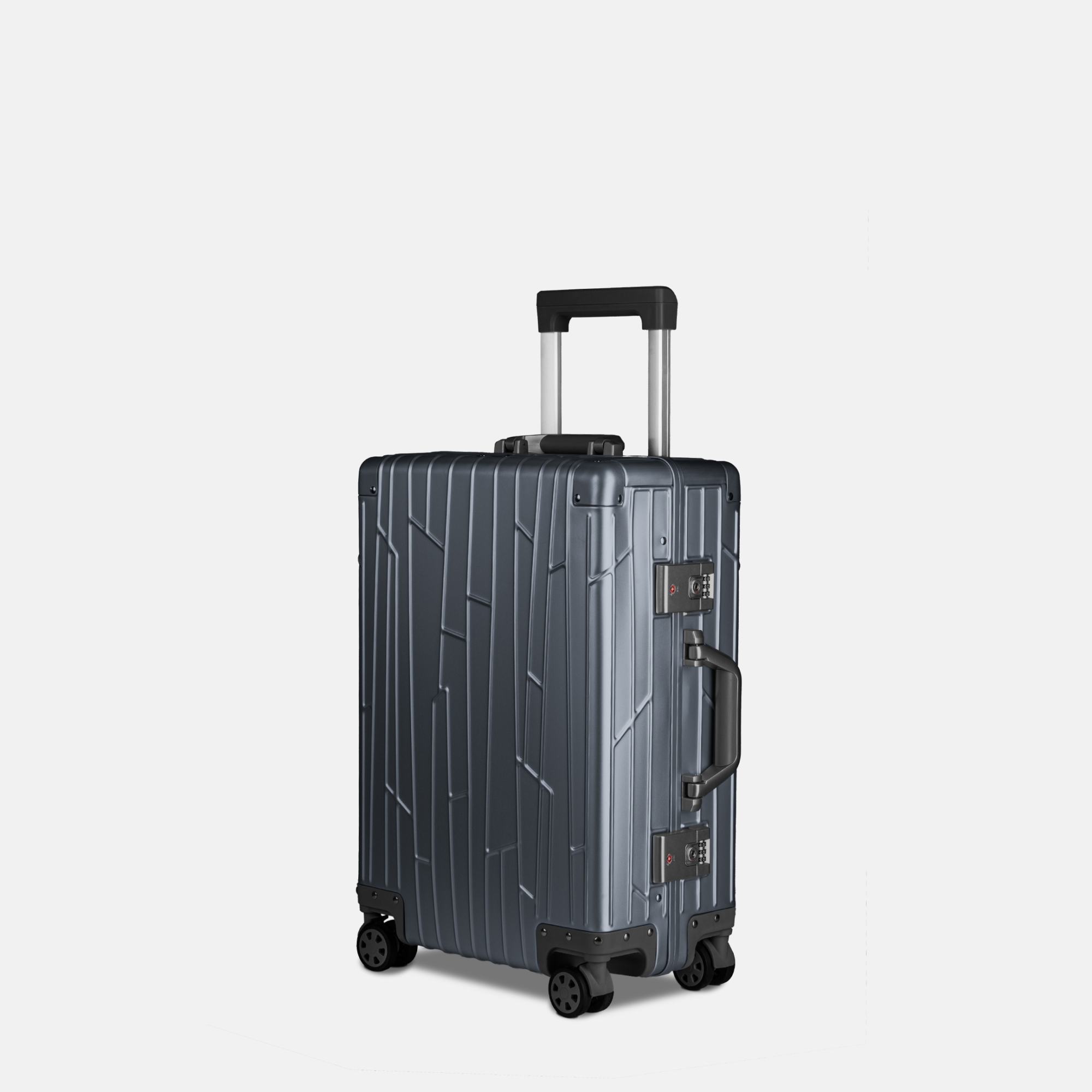 GUNDEL Aluminiumkoffer in Blau Grau, schräg stehend, mit Linienmuster und Teleskopgriff.