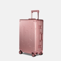 GUNDEL Rosegold aluminium suitcase, angled, with a line pattern and telescopic handle.